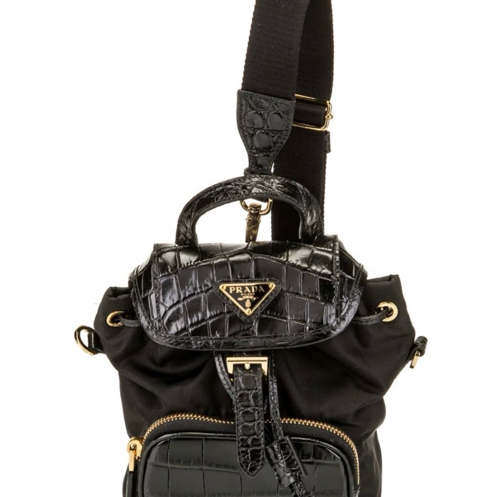 Prada small bucket bag backpack. Nylon and croc embossed details.